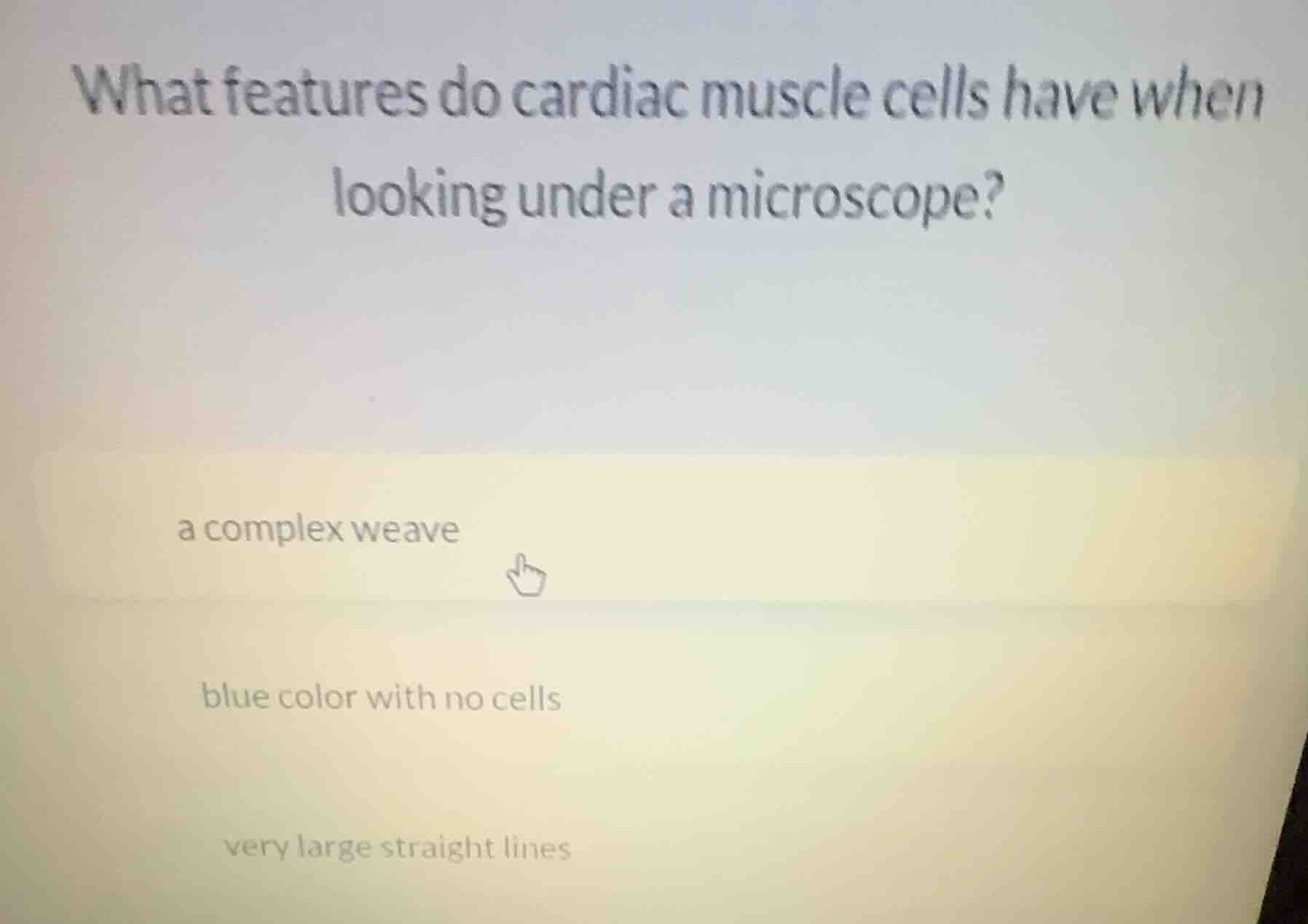 what features do cardiac muscle cells have when looking under a microsc…