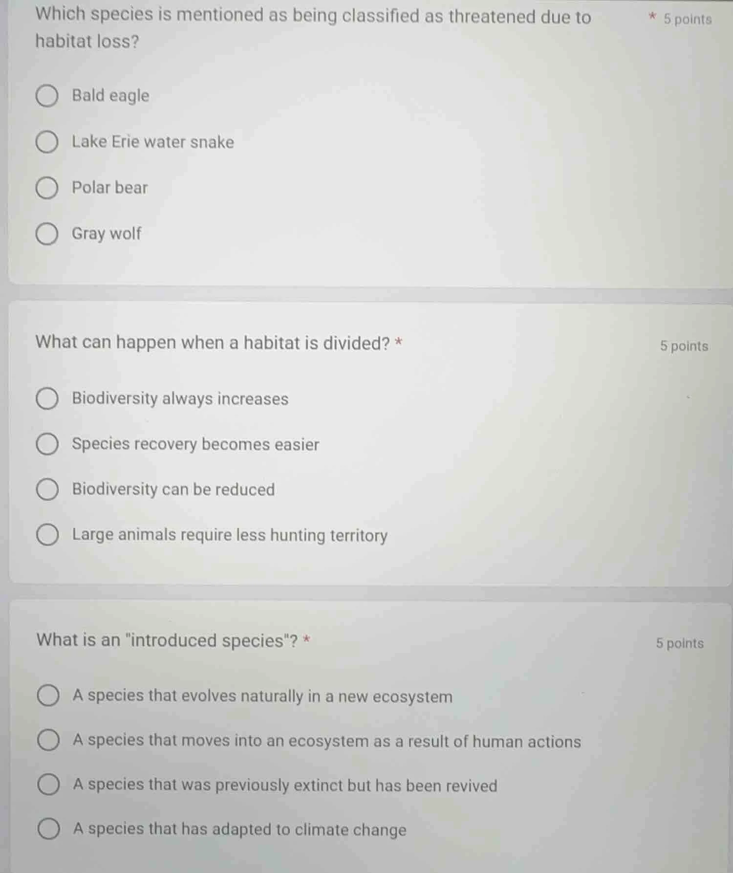 which species is mentioned as being classified as threatened due to hab…