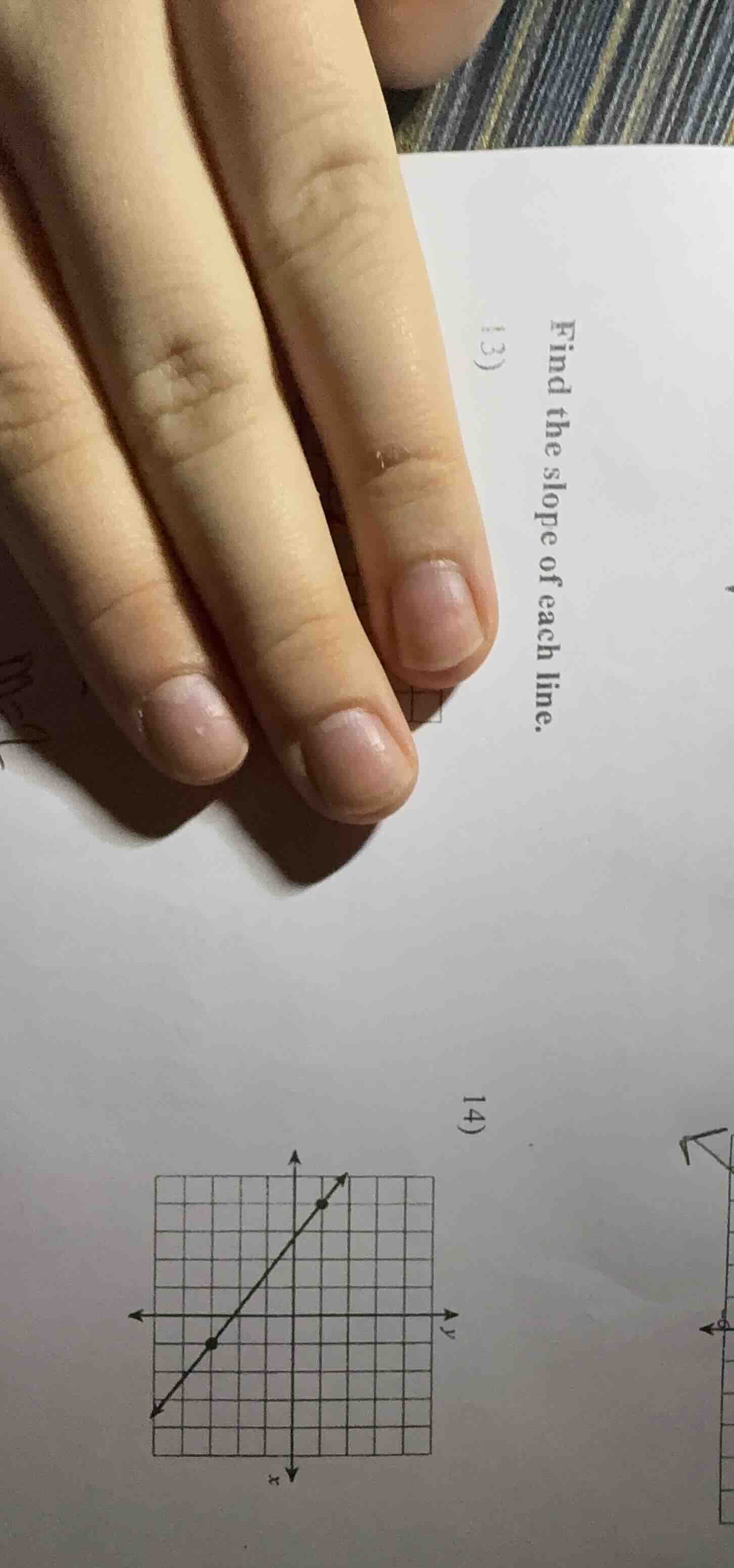 13) find the slope of each line. 14) a coordinate grid with a line pass…