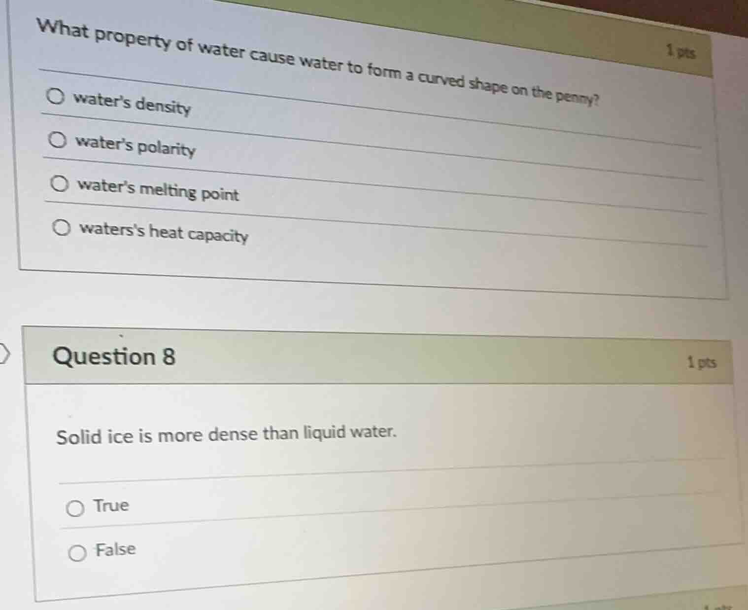 what property of water cause water to form a curved shape on the penny?…