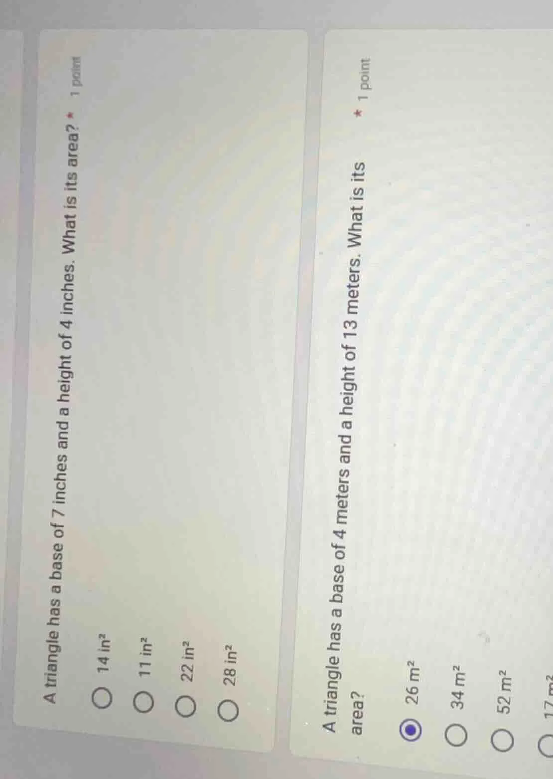 a triangle has a base of 7 inches and a height of 4 inches. what is its…