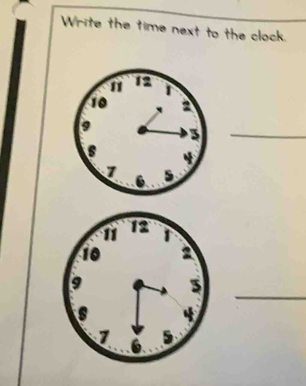 write the time next to the clock.