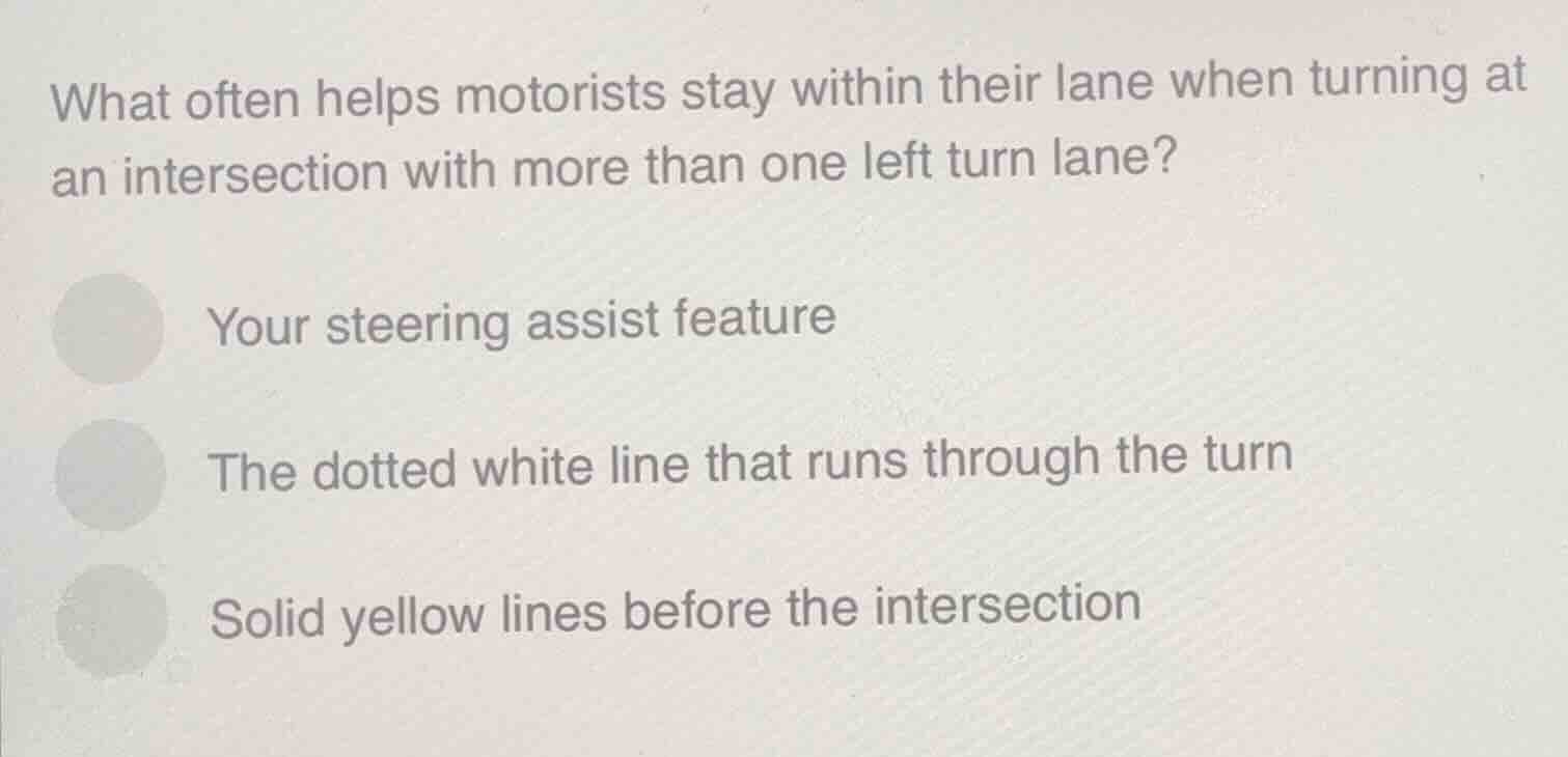 what often helps motorists stay within their lane when turning at an in…