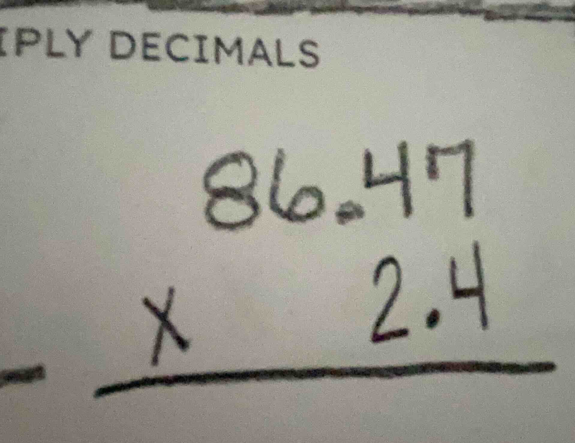 iply decimals 86.47 × 2.4