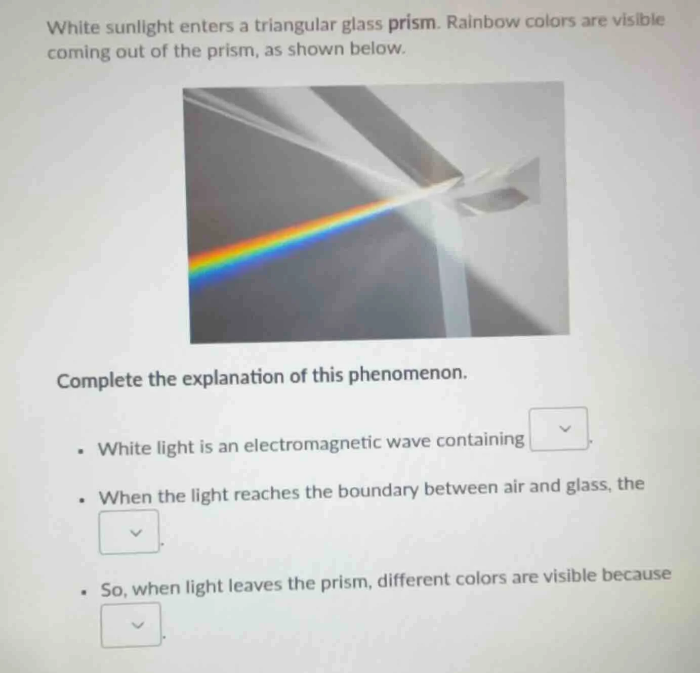 white sunlight enters a triangular glass prism. rainbow colors are visi…