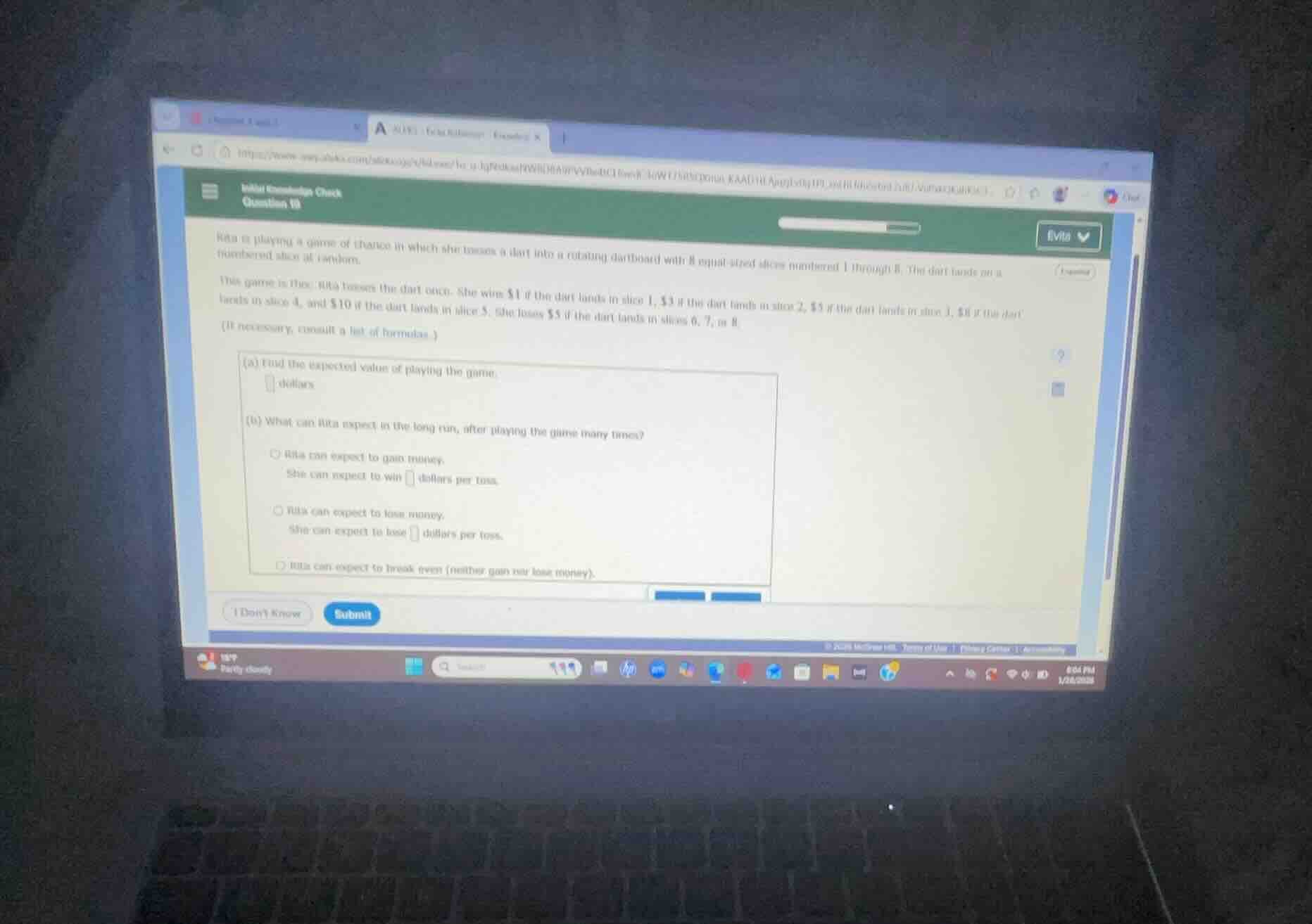 rita is playing a game of chance in which she tosses a dart into a rota…