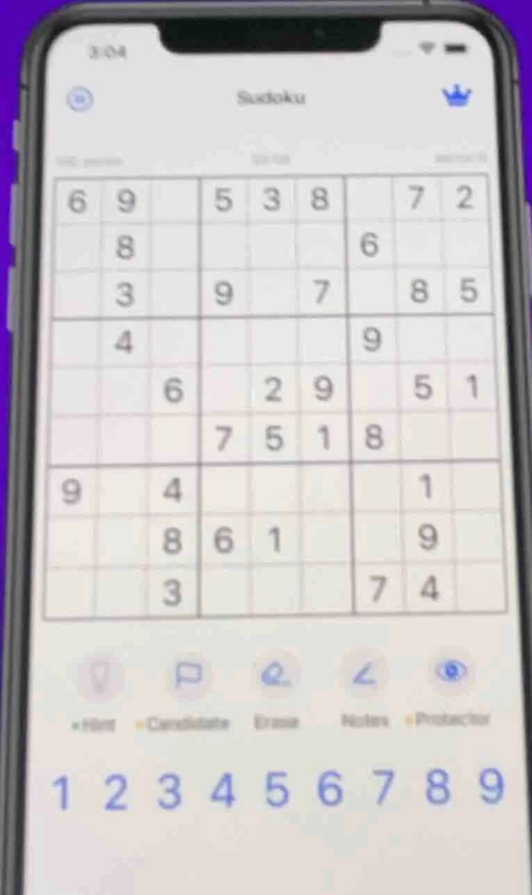the image shows a sudoku puzzle on a mobile phone screen. the sudoku gr…