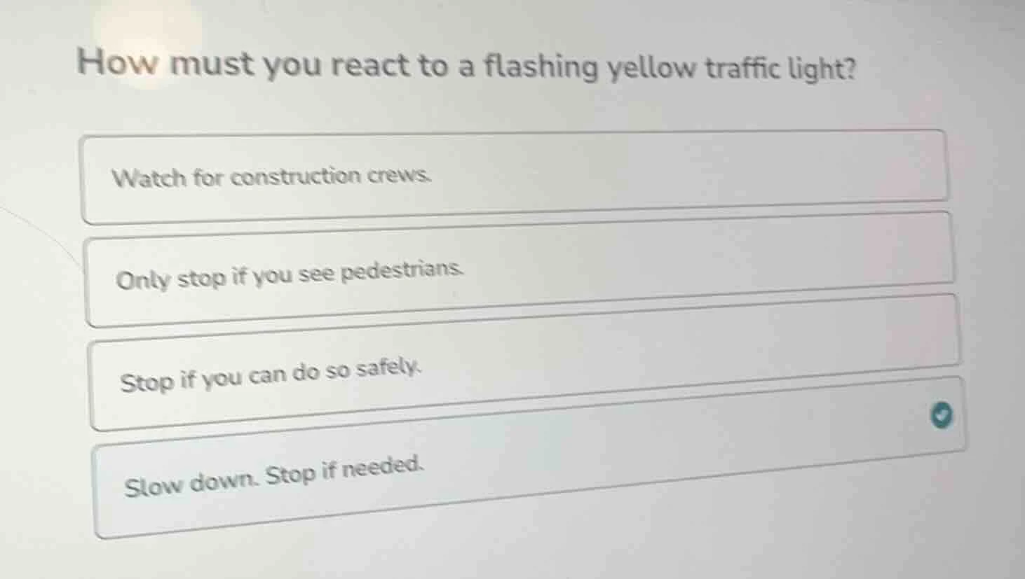 how must you react to a flashing yellow traffic light? watch for constr…