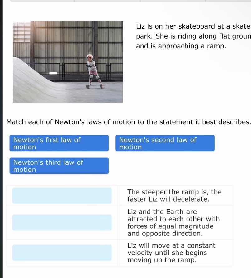 liz is on her skateboard at a skate park. she is riding along flat grou…