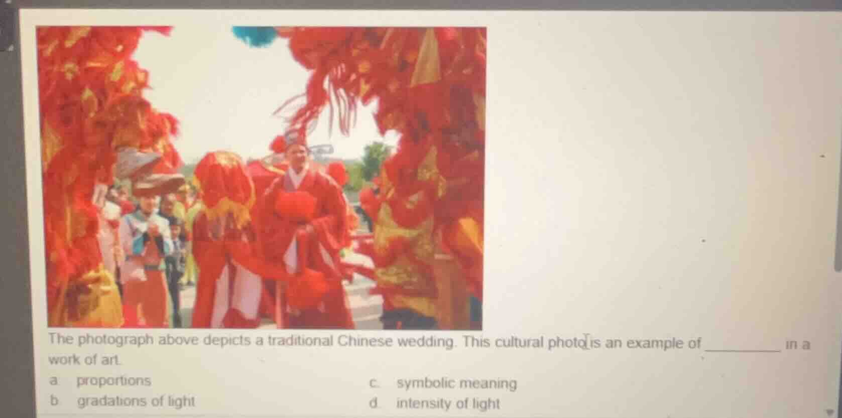 the photograph above depicts a traditional chinese wedding. this cultur…