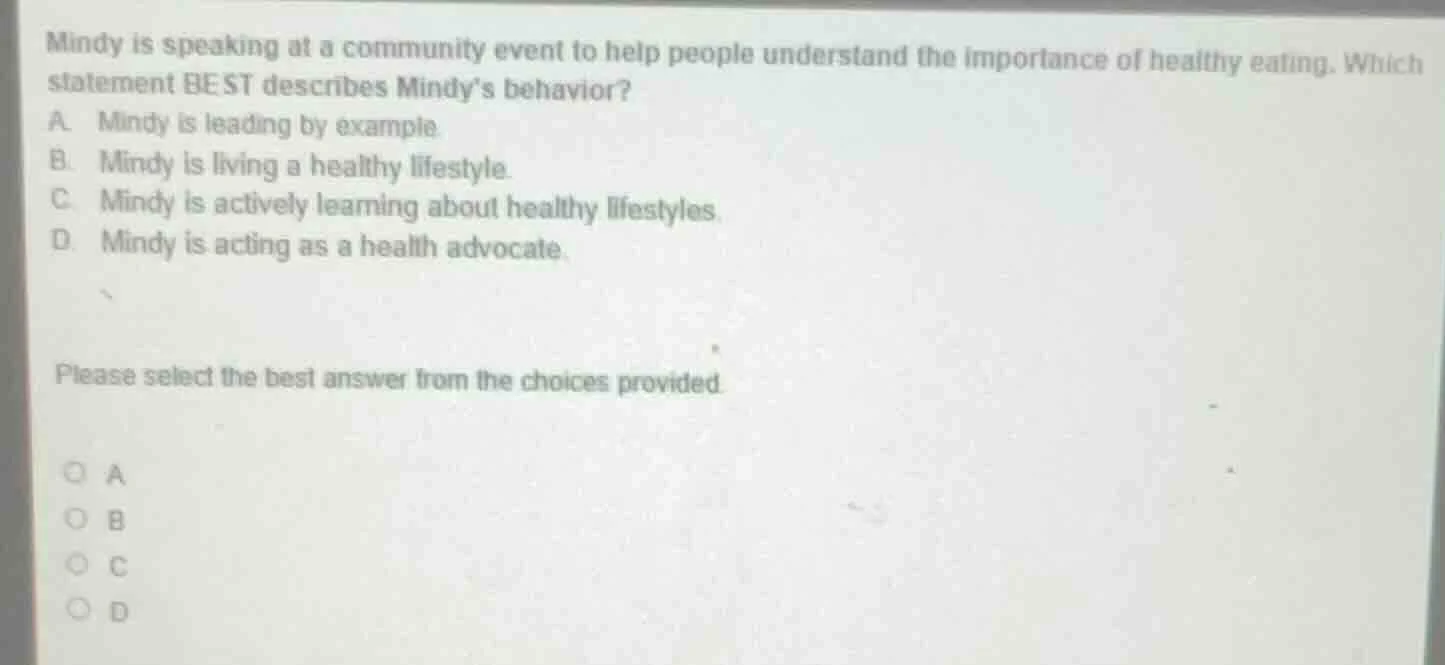 mindy is speaking at a community event to help people understand the im…