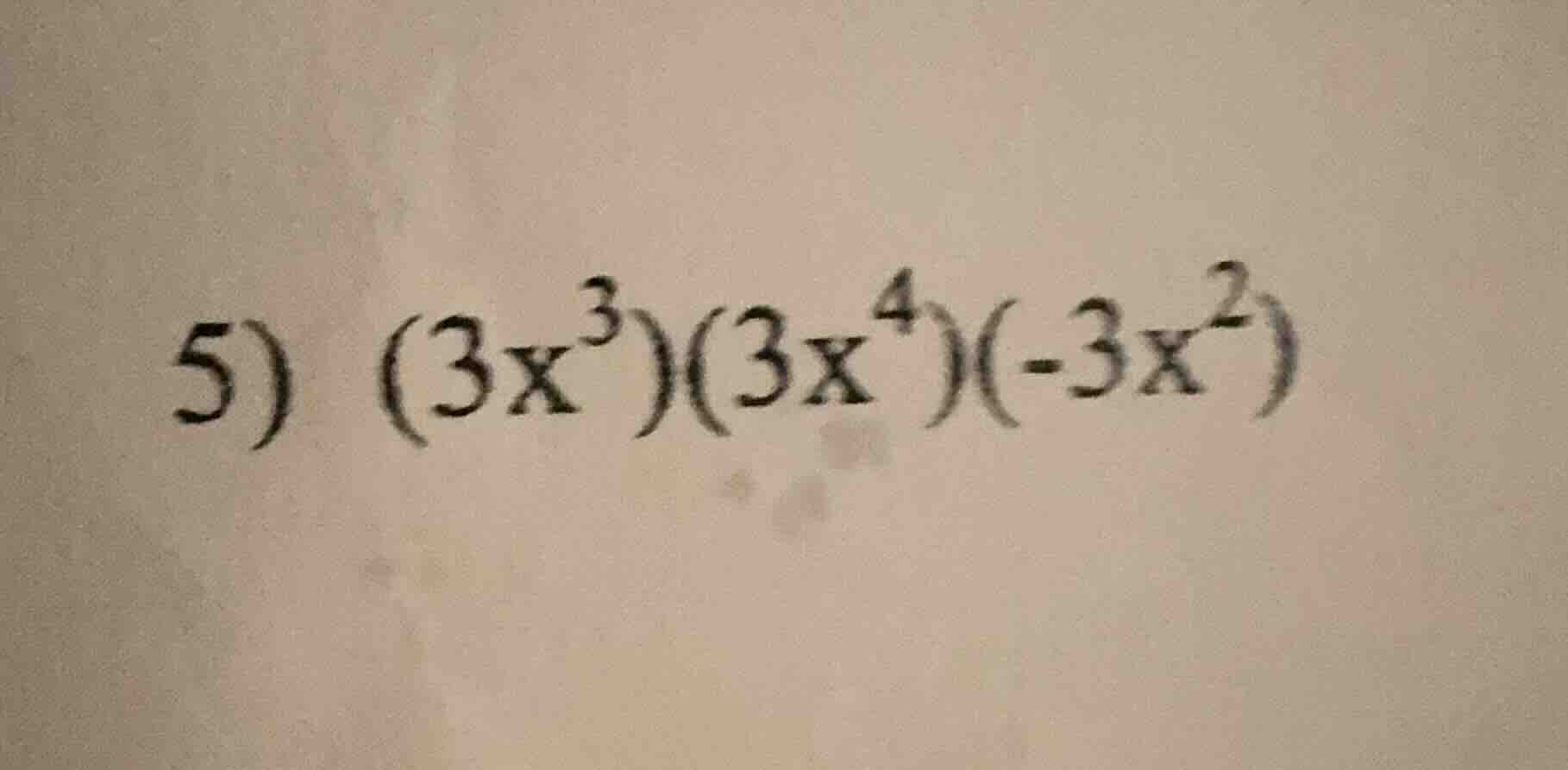 5) $(3x^{3})(3x^{4})(-3x^{2})$