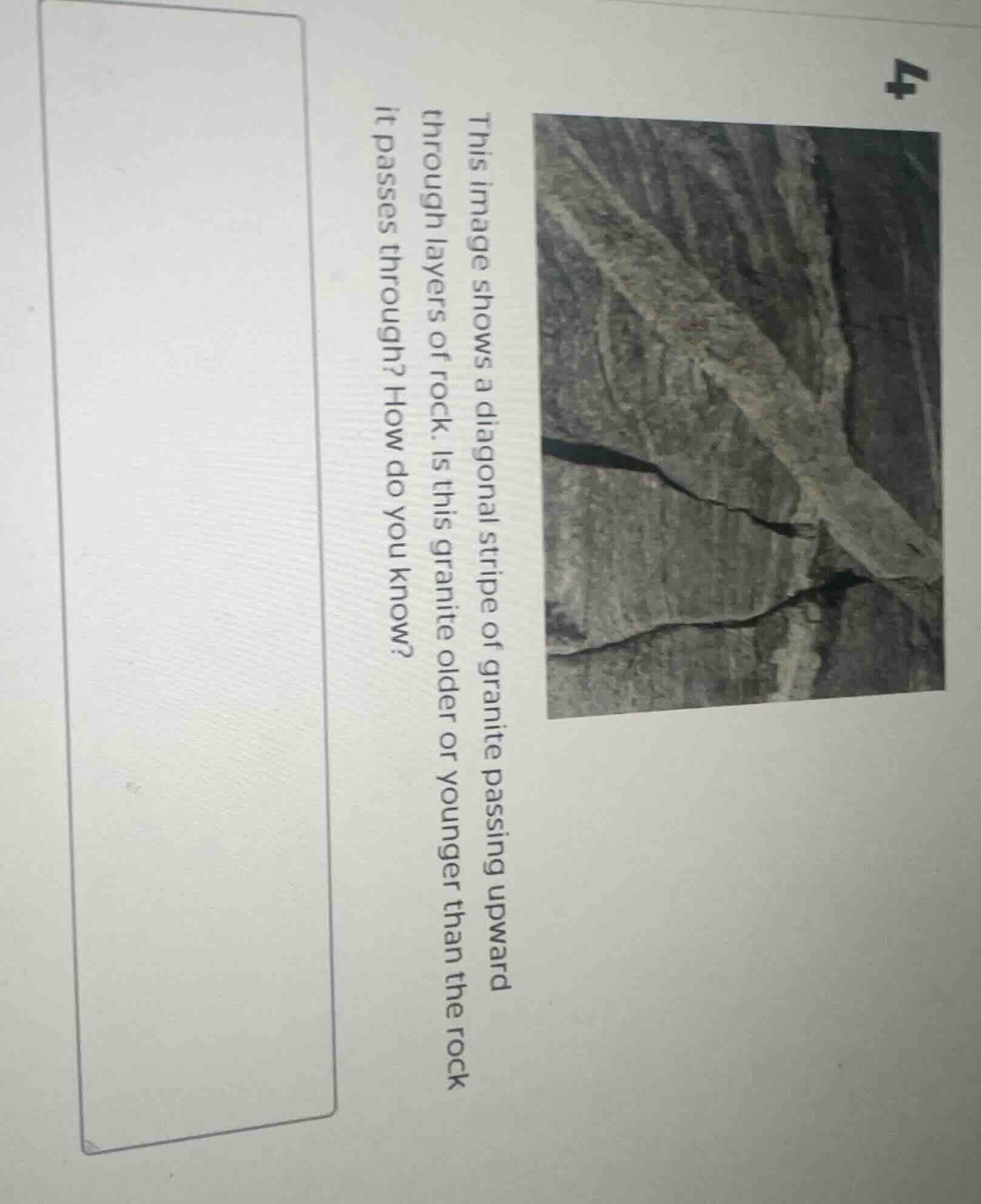 this image shows a diagonal stripe of granite passing upward through la…