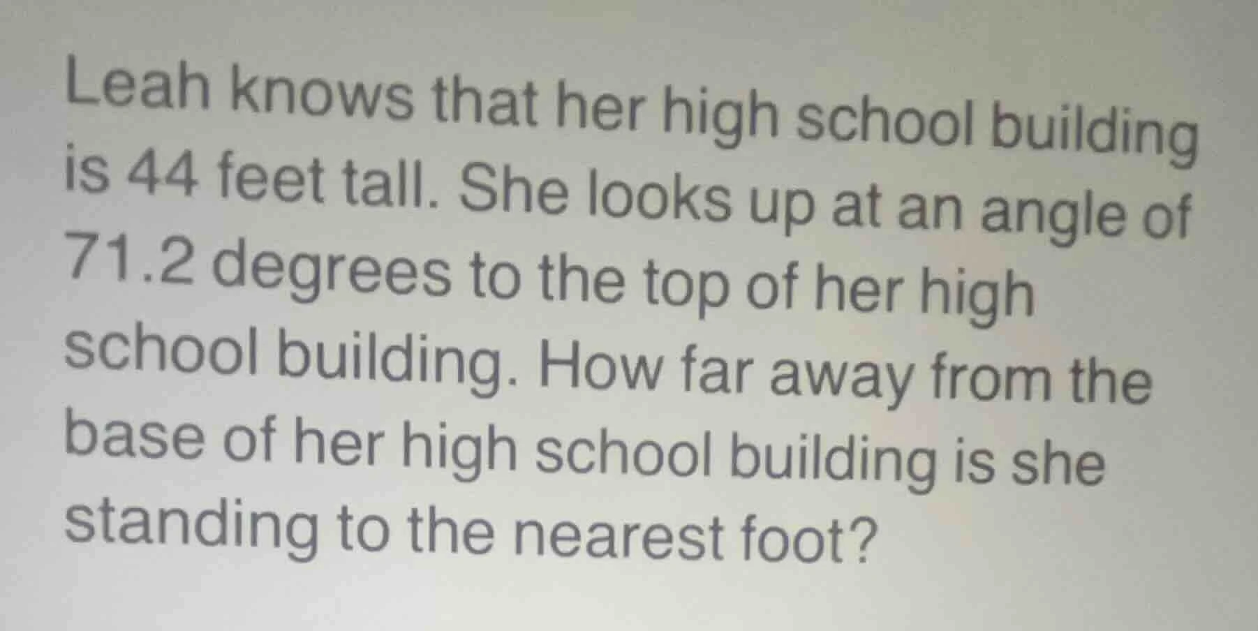 leah knows that her high school building is 44 feet tall. she looks up …