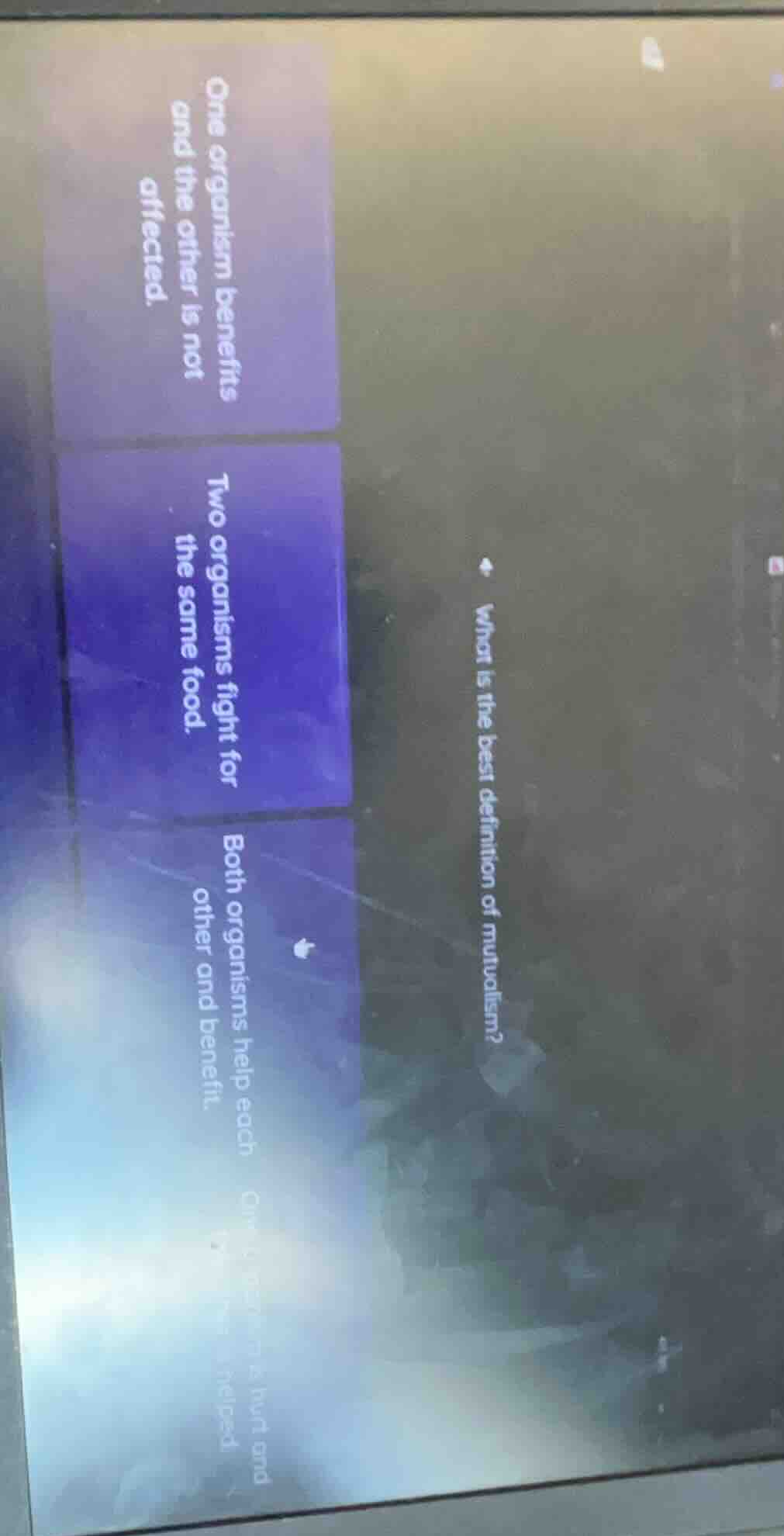 what is the best definition of mutualism? one organism benefits and the…