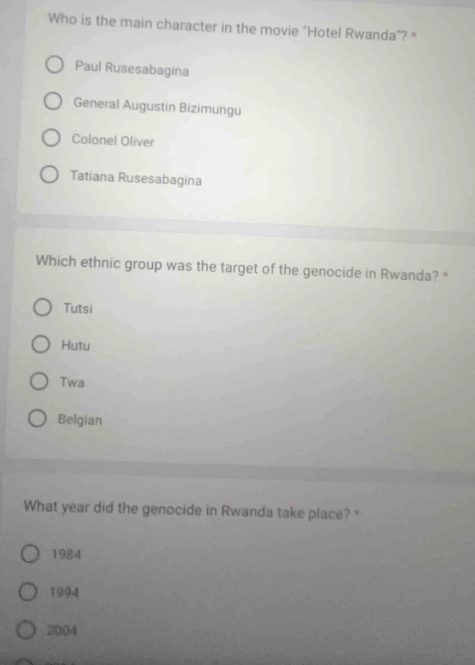 who is the main character in the movie \hotel rwanda\? paul rusesabagin…