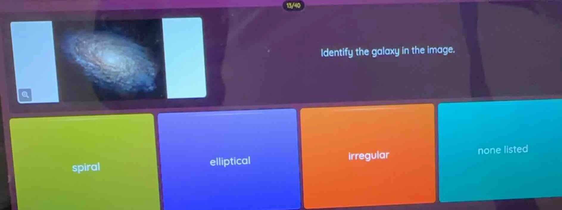 identify the galaxy in the image. spiral elliptical irregular none list…