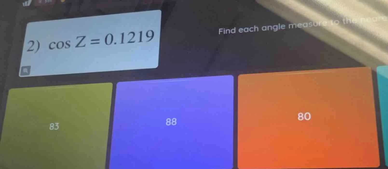 2) \\(\\cos z = 0.1219\\) find each angle measure to the neare