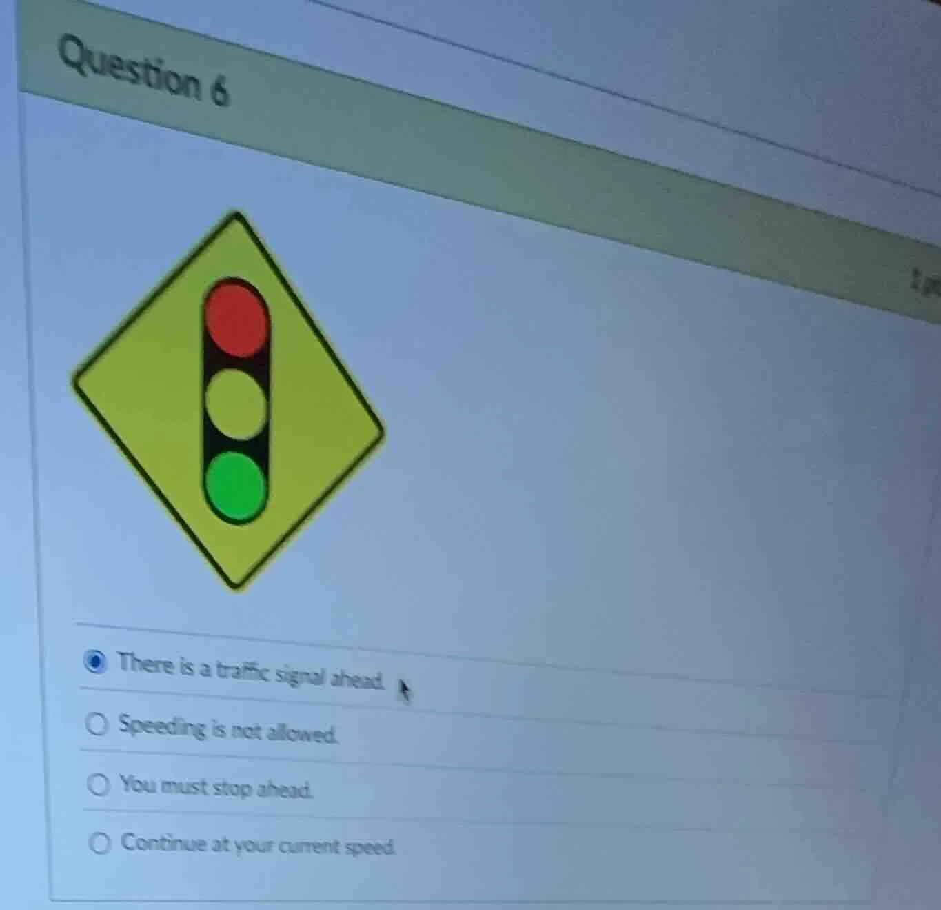question 6 there is a traffic signal ahead. speeding is not allowed. yo…