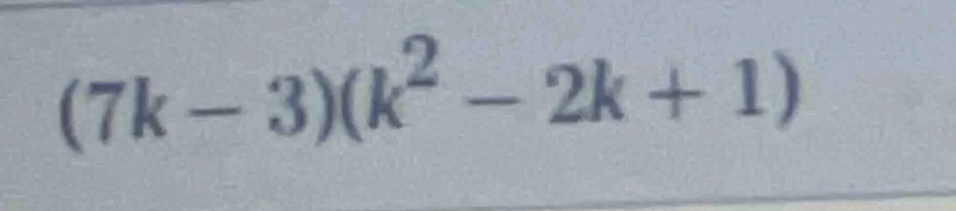 $(7k - 3)(k^{2} - 2k + 1)$