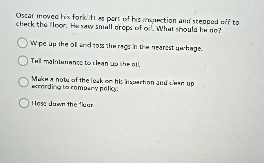oscar moved his forklift as part of his inspection and stepped off to c…