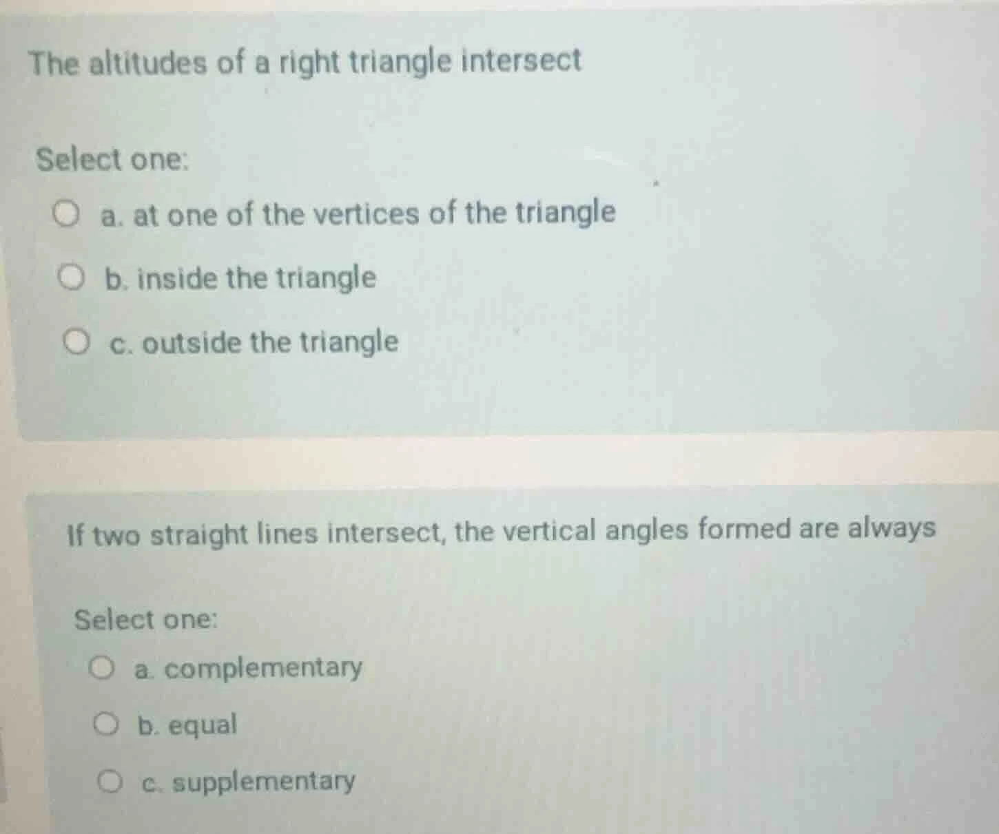 the altitudes of a right triangle intersect select one: a. at one of th…