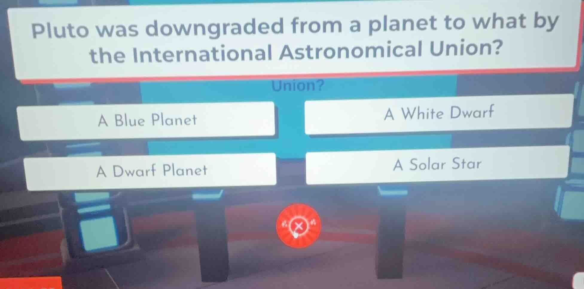 pluto was downgraded from a planet to what by the international astrono…