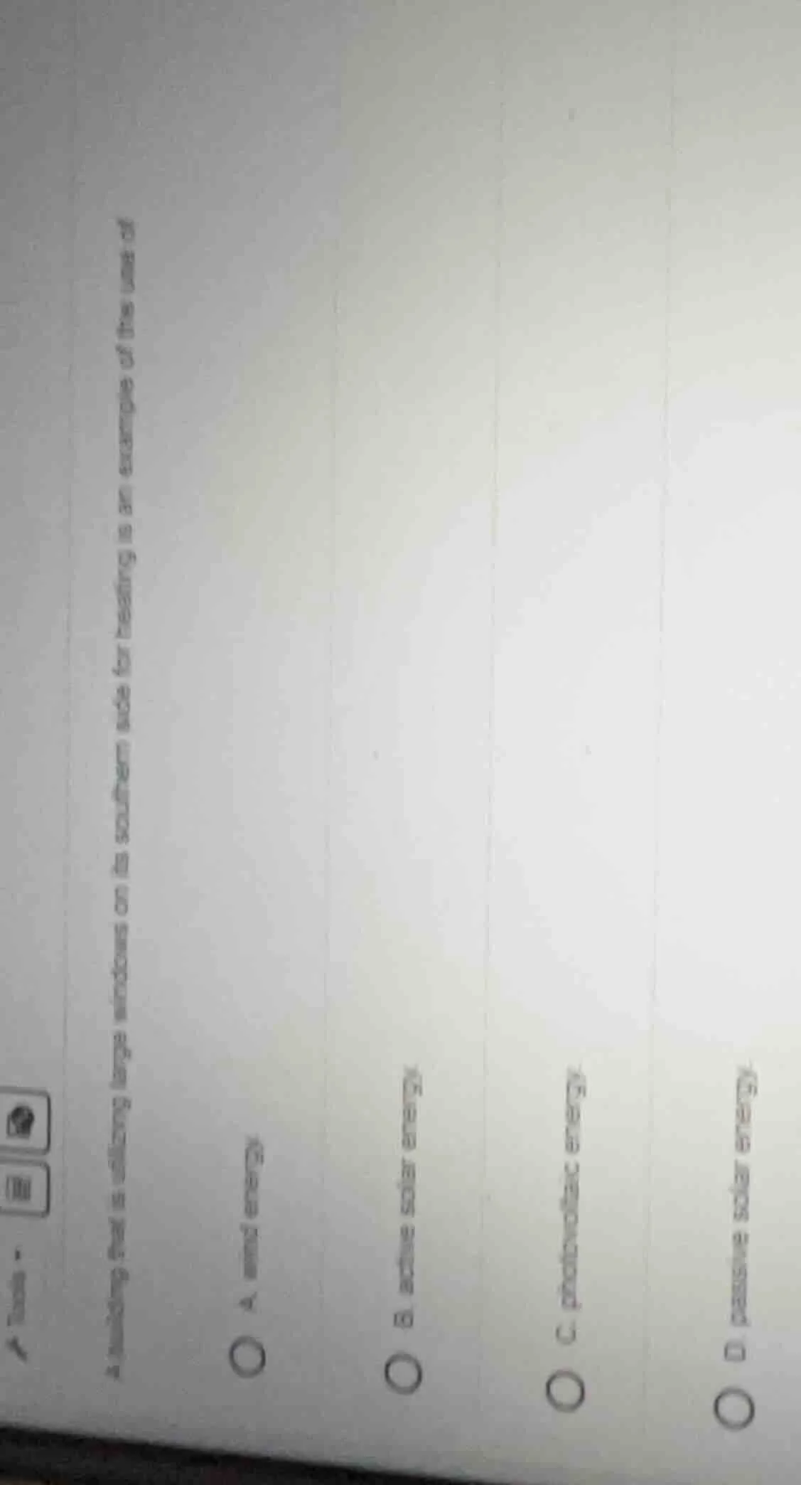 a building that is utilizing large windows on its southern side for hea…