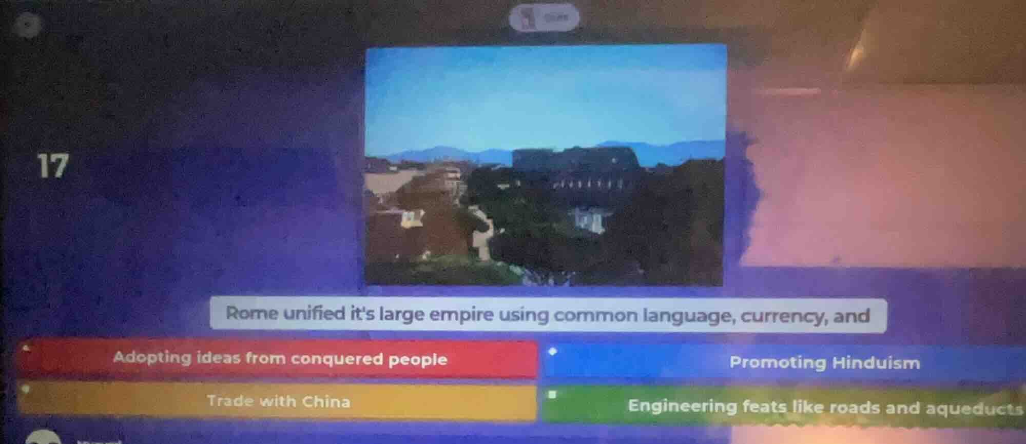 17 rome unified its large empire using common language, currency, and a…