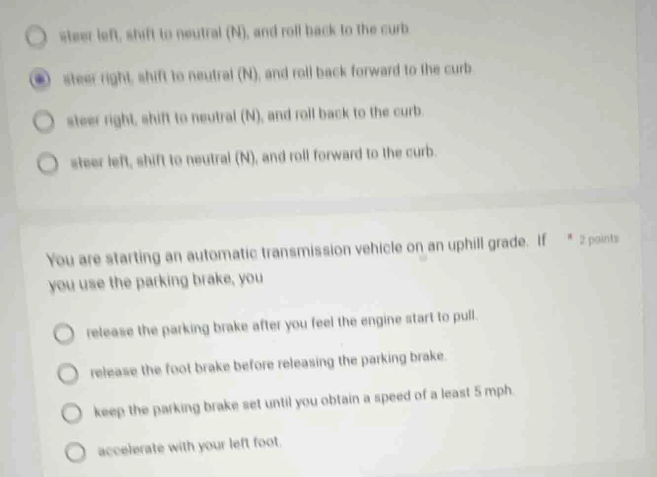 1.○ steer left, shift to neutral (n), and roll back to the curb● steer …
