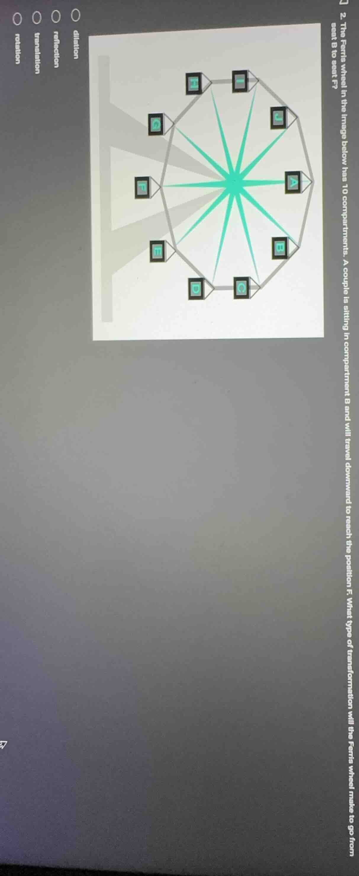 2. the ferris wheel in the image below has 10 compartments. a couple is…