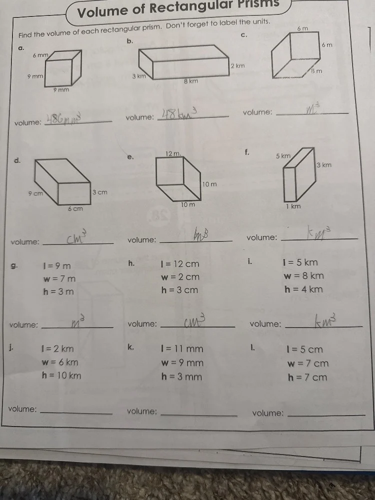 volume of rectangular prisms find the volume of each rectangular prism.…