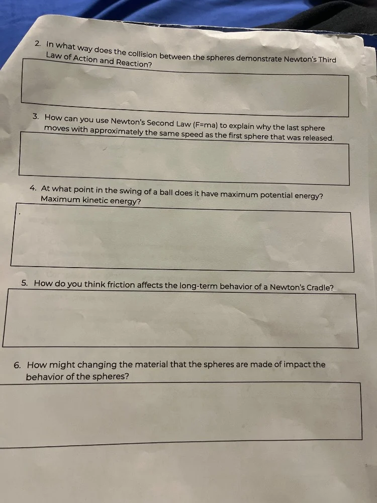 2. in what way does the collision between the spheres demonstrate newto…