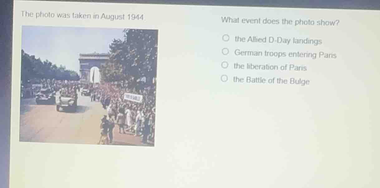 the photo was taken in august 1944.what event does the photo show?○ the…