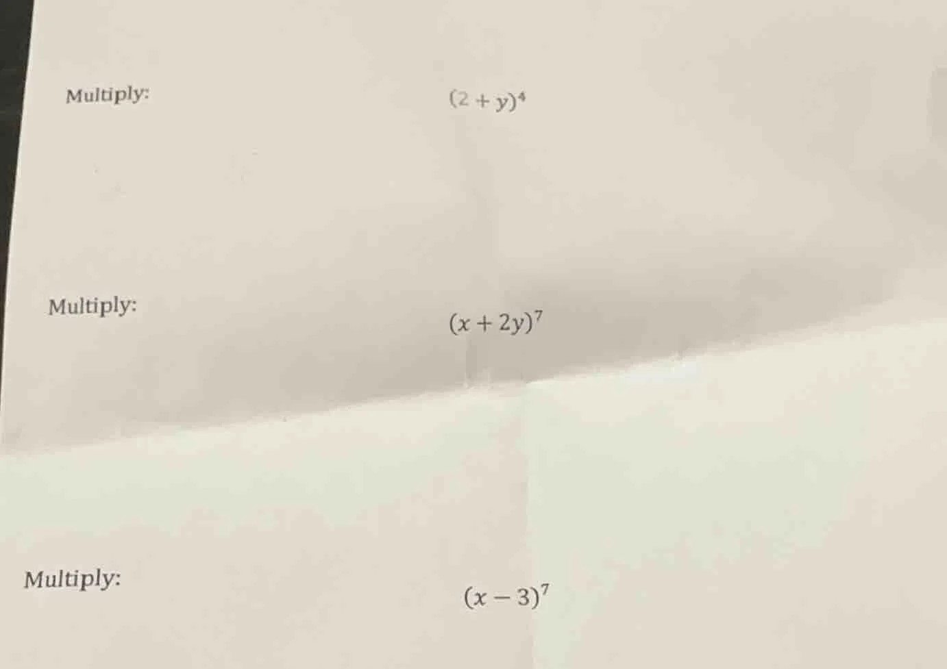 multiply: $(2 + y)^4$ multiply: $(x + 2y)^7$ multiply: $(x - 3)^7$